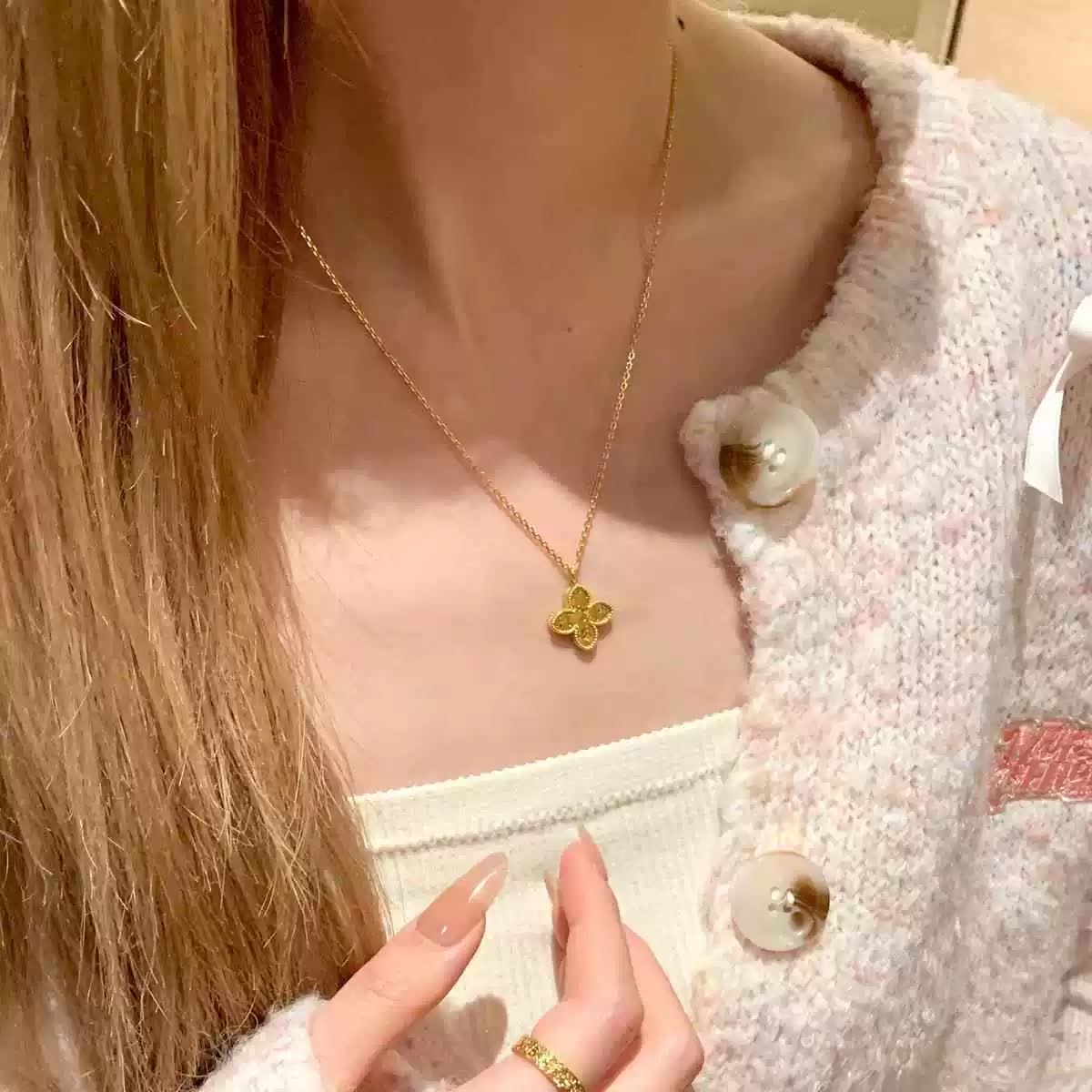 Van Cleef & Arpels Gold and Silver Flower Pendant Necklaces